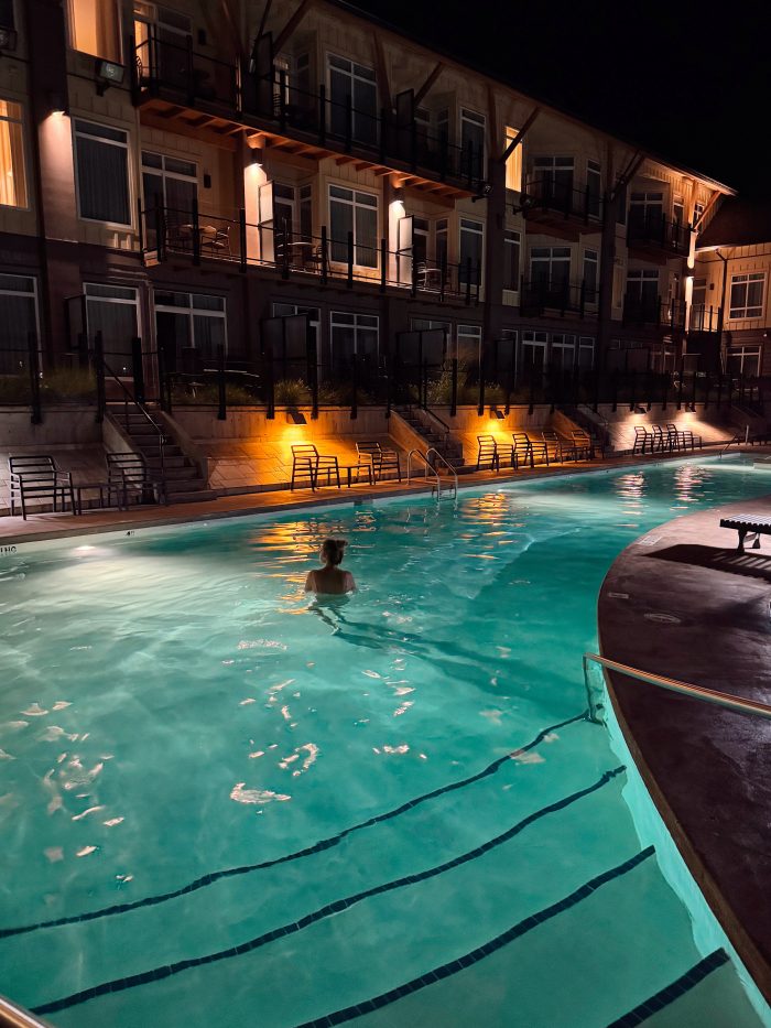 girl in pool at night
